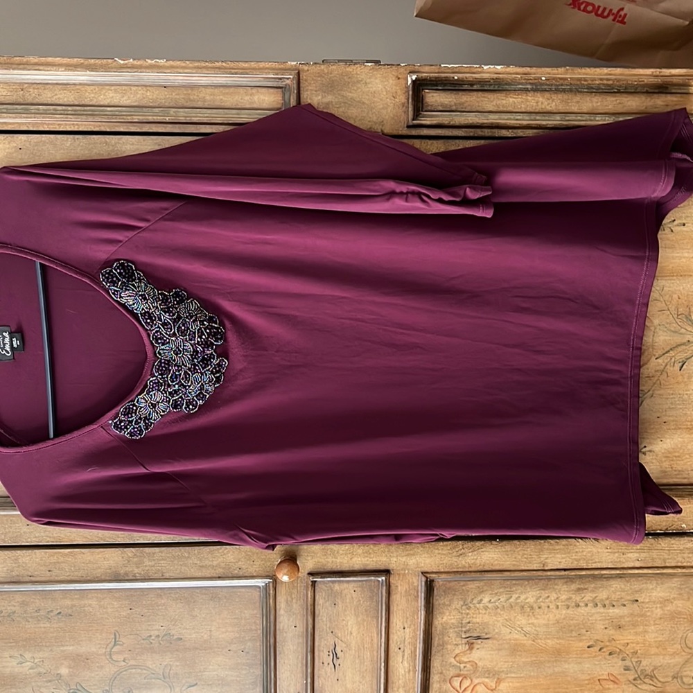 Like new embellished top